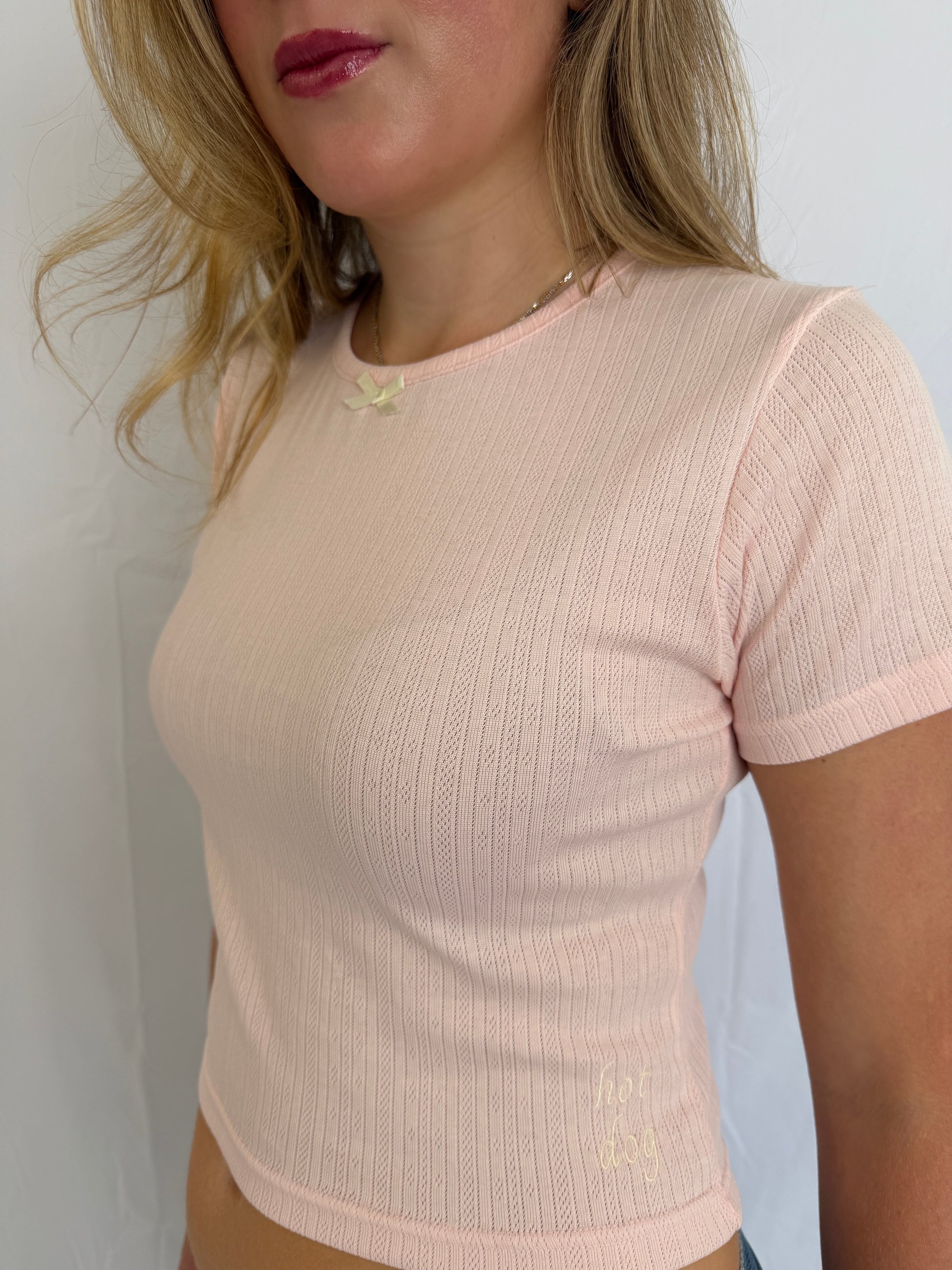 Pointelle Baby Tee in blush pink, close-up of the pointelle knit
